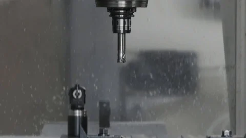 Cnc metal working machine with cutter tool luminium detail milling at factory Stock Footage 100022035