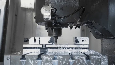 Cnc metal working machine with cutter tool luminium detail milling at factory Stock Footage 100119738