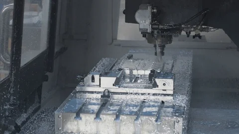 Cnc metal working machine with cutter tool luminium detail milling at factory Stock Footage 100121993