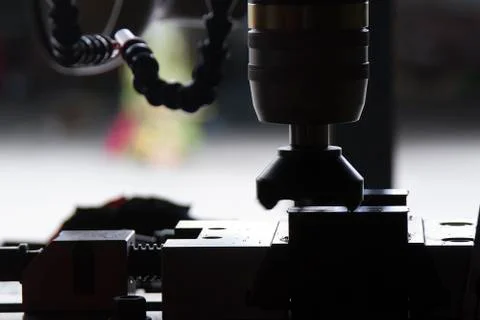 CNC miling of cutting face of raw material Stock Photos