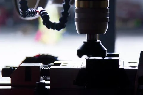 CNC miling of cutting face of raw material for business Stock Photos