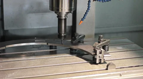 CNC milling machine drilling hole in stiil part Vidéo 60235445