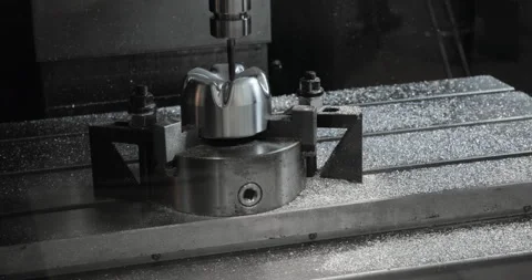 CNC milling machine makes some steel part on a factory Stock Footage 87861465