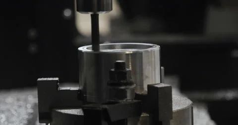 CNC milling machine makes some steel part on a factory Video stock 87869866