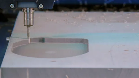 CNC Milling Machine Makes Some Plastic Part on a Factory Stock Footage 91999132