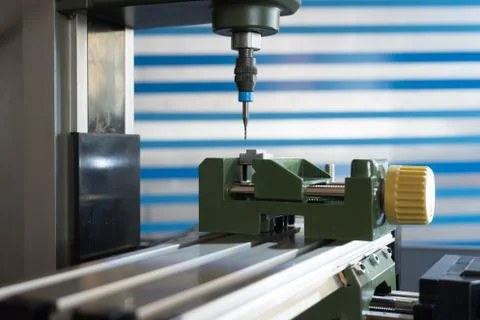 CNC milling machine processing plastic detail.Cutting plastic  modern process Foto stock
