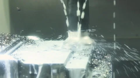 CNC milling machine work. Coolant and lubrication in gear metalwork industry 動画素材 131397550