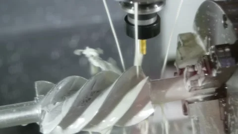 CNC milling machine work. metal processing with coolant Stock Footage 154911351