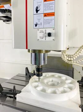 CNC milling machine working show it to customers in Metalex Stock Photos