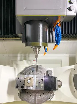 CNC milling machine working show it to customers in Metalex exhibition Stock Photos