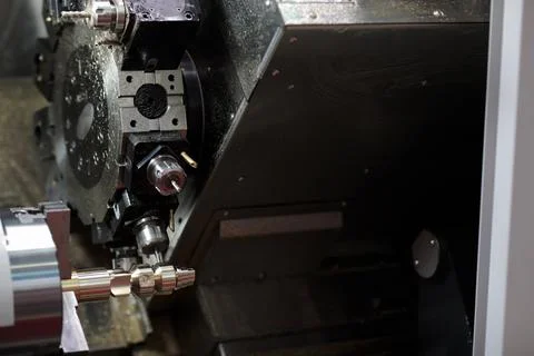 CNC milling process on a lathe machining center Stock Photos