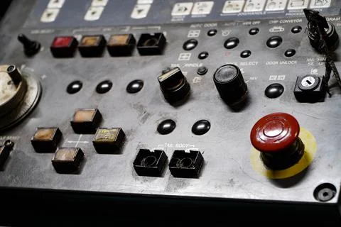 CNC operation panel through a long time use.Selective focus. Stock Photos
