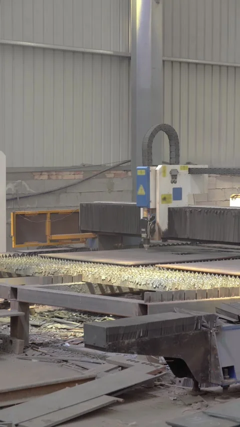 CNC Plasma Cutting Machine Cutting Steel Plate in Automated Metal Fabrication Stock Footage 339384517