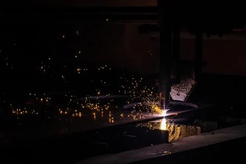 CNC plasma cutting machine during operation. Stock Photos
