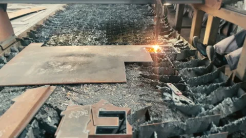 CNC Plasma Cutting Machine Precisely Slicing Metal Sheet in Industrial Workshop Stock Footage 312339891