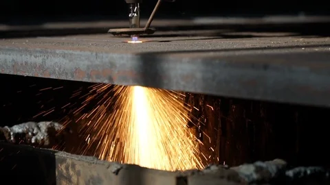 CNC plasma machine cuts metal creating bright sparks closeup Stock Footage 118580371