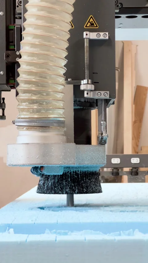 A CNC router performing rough milling of a sculpture in an extruded polysty.. Stock Footage 300866046