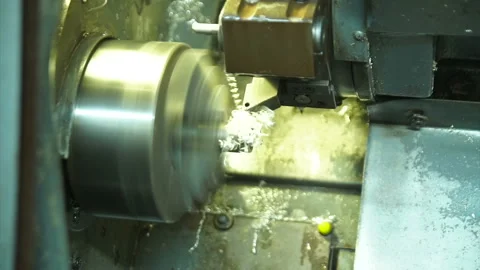 Cnc silver bar cutting lathe. silver ring production. Stock Footage 139610450