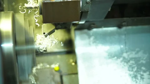 Cnc silver bar cutting lathe. silver ring production. Stock Footage 139625381