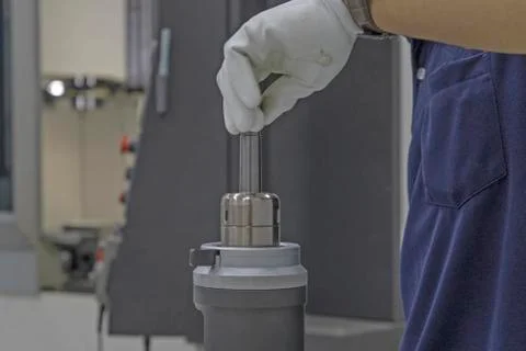 CNC tools of hand man setting tooling Stock Photos