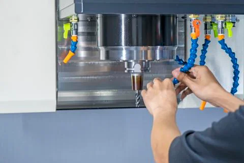 CNC tools of hand man setting tooling Stock Photos