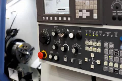CNC turning lathe machine with a control panel Stock Photos