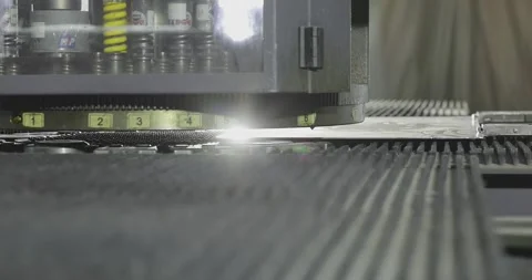 CNC Turret Punch Press Processing Aluminum Sheet Metal. Precision Metal Video stock 337192975