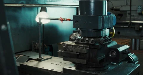 CNC type multipurpose lathe for drilling brass shaft. High-tech metal processing Stock Footage 167366691