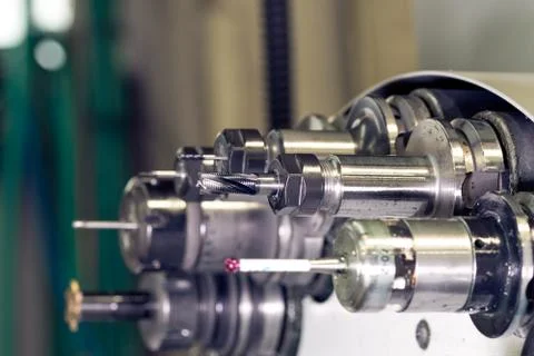 CNC in workshop Rotating head with tools Stock Photos