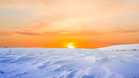 Cnowbound plain at the red dramatic sunset time lapse scene Stock Footage 155107209