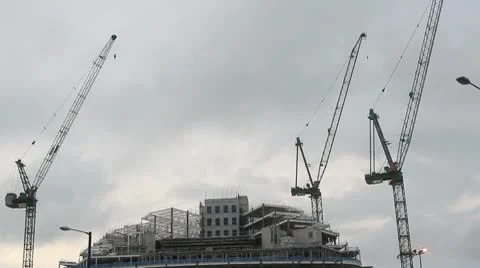 CO-OP Angel Square Building under construction with people walking-Time Lapse Stock Footage 10700036