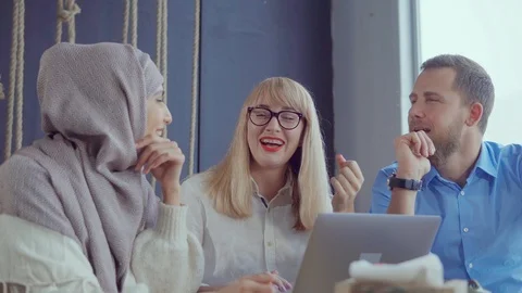 Co-workers on a break in a cafe. Stock Footage 107741472