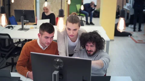 Co-workers celebrating a successful project Happy multiracial business team w Stock-Footage 142168624
