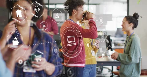 Co-workers gathering for coffee break, man placing VR headset on colleague, Stock-Footage 315541301