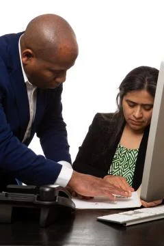 Co-Workers Having a Collaborative Meeting Stock Photos