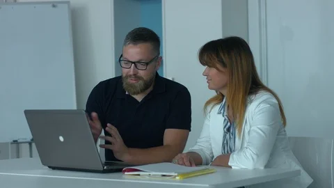 Co-workers in office Video stock 93862749