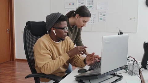 Co-workers Solving Problem With Cybersecurity Stock Footage 232665599