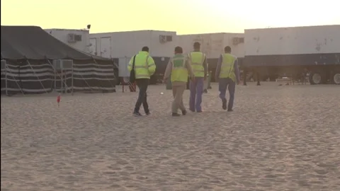 Co-workers walking on the desert project Video stock 144800862