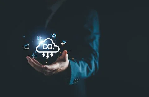 CO2 Carbon dioxide emission reduction, businessman and environmental technolo Stock Photos