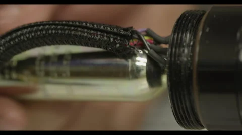 CO2 cartridge being screwed in Stock Footage 56970167