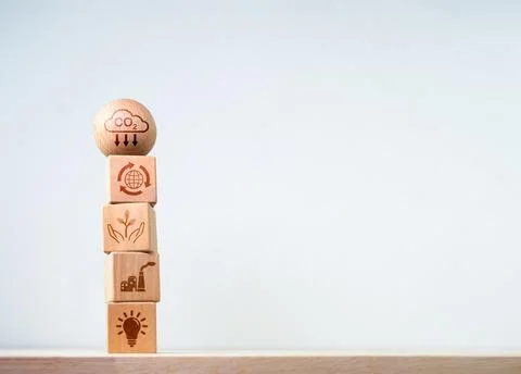 Co2 environment, global warming concepts. Green icon on wooden block stack .. Stock Photos