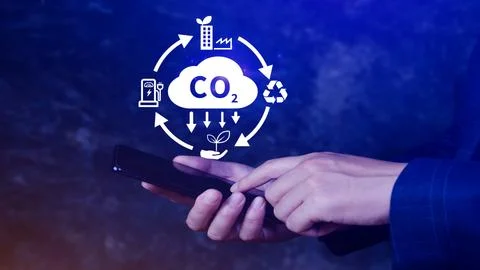 CO2 reducing icon using smartphone for decrease CO2, carbon footprint and c.. Stock Photos