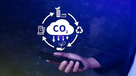 CO2 reducing icon using smartphone for decrease CO2, carbon footprint and c.. Stock Photos