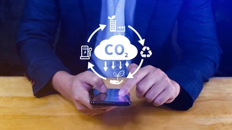 CO2 reducing icon using smartphone for decrease CO2, carbon footprint and c.. Stock Photos