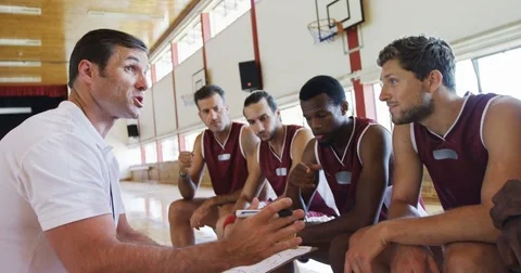 Coach and player interacting with each other Stock Footage