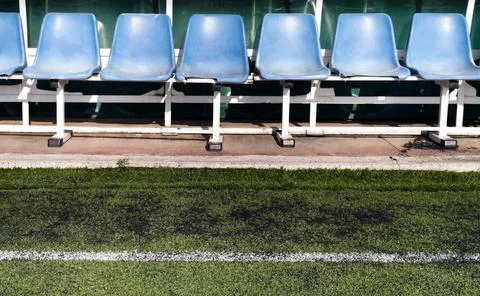 Coach and reserve benches in a soccer field Coach and reserve benches in a... Stock Photos