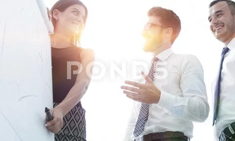 Coach conducts training with business team. Stock Photos