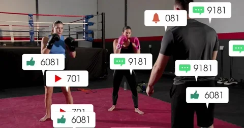 Coach cueing boxing drill, trainees throwing jabs, notification icons covering Stock Footage 321845176