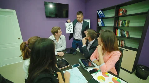Coach explains team basis of the CASHFLOW Quadrant Stock Footage 32277837