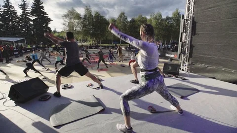 Coach Group Demonstrate Expander Physical Exercise Stock Footage 107564825